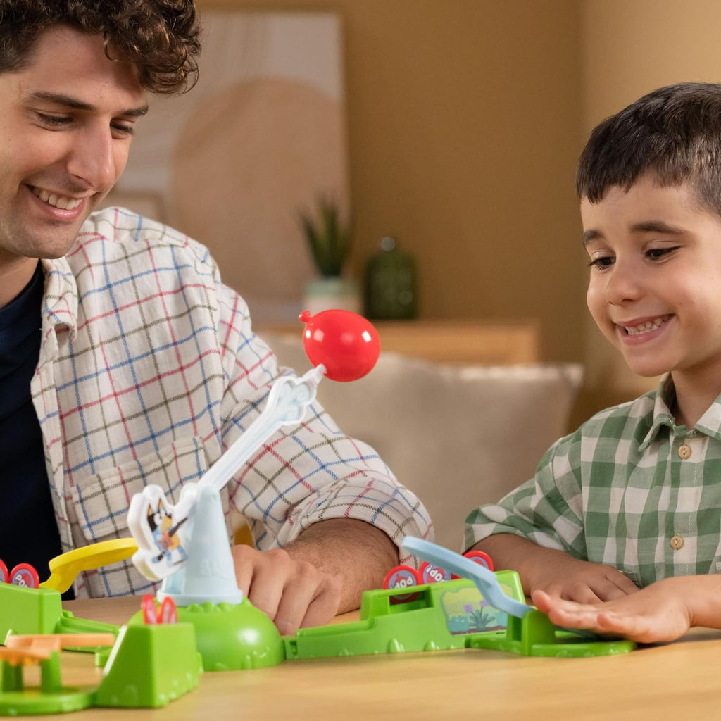 Keepy Uppy Game. Help, Bingo, and Chilli Keep the Motorized Balloon in the Air with the Character Paddles for 2-3 Players. Ages 4+