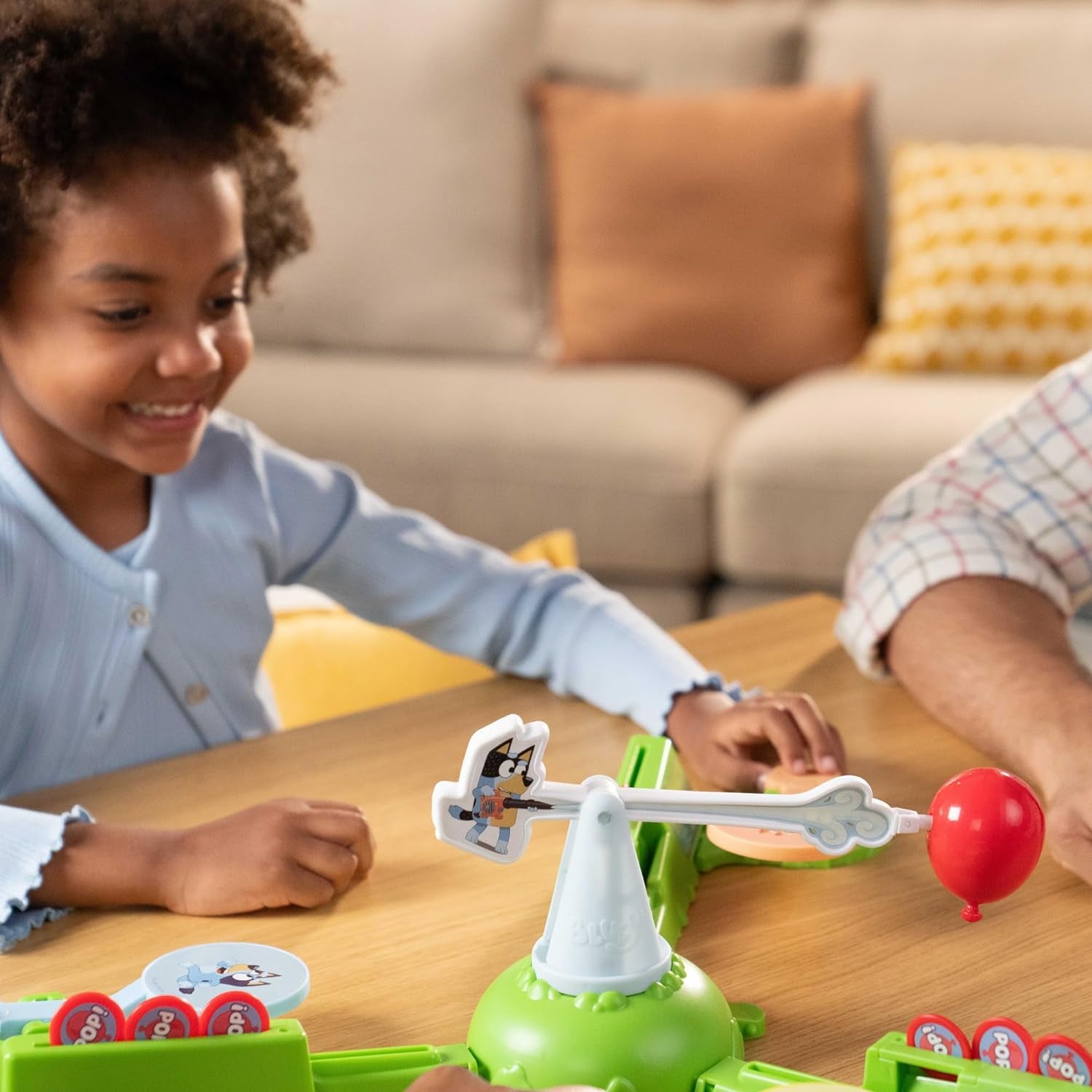 Keepy Uppy Game. Help, Bingo, and Chilli Keep the Motorized Balloon in the Air with the Character Paddles for 2-3 Players. Ages 4+